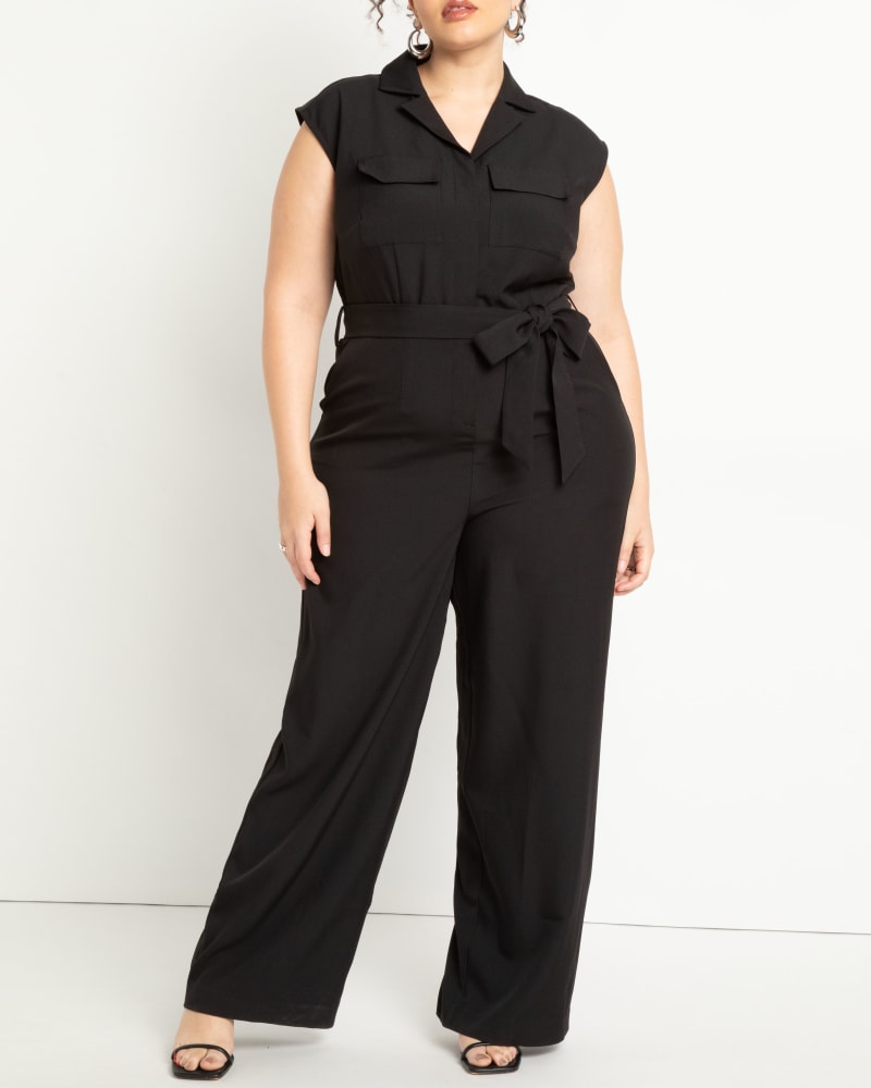 Front of a model wearing a size 22 Belted Jumpsuit in Black Onyx by ELOQUII. | dia_product_style_image_id:272776